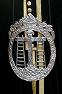 Medallón del Pertiguero del Cuerpo de Acólitos del paso de la Urna de la Hermandad del Santo Entierro