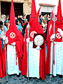 Nazareno portando el Libro de Reglas de la Hermandad de la Cena