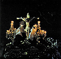 A finales de los 70, el paso del Cristo del Amor sin Nuestra Señora de los Remedios, que procesionaba en su paso de palio; en su lugar la Santísima Virgen de Gracia 