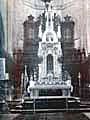 Baldaquino, órgano y coro de Santiago. La foto es anterior a 1948, año en el que el coro volvió a su primitivo lugar del Monasterio de la Cartuja de la Defensión