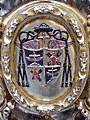 Escudo de la Hermandad, en el respiradero frontal del Paso del Santo Crucifijo de la Salud