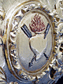 Escudo de los Agustinos, en el respiradero lateral derecho del Paso del Santo Crucifijo de la Salud