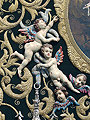 Detalle de angelitos sosteniendo un ancla en el Simpecado de la Hermandad de la Yedra