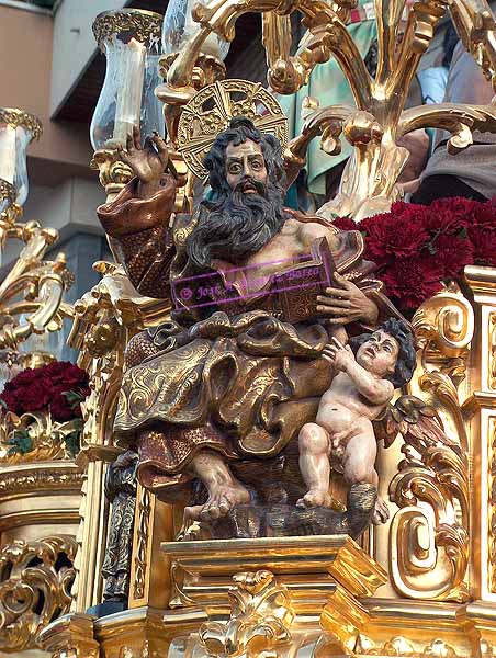 Evangelista de las esquinas de la canastilla del Paso de Misterio del Santísimo Cristo de la Coronación de Espinas