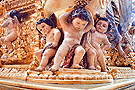 Angelitos en la canastilla del Paso de Misterio de la Sagrada Cena de Nuestro Señor Jesucristo