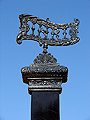 INRI de la Cruz de Guía de la Hermandad de la Cena