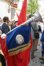 Nazareno con bocina de la Hermandad de la Sagrada Cena