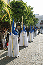Nazarenos del cortejo del paso de Misterio de la Hermandad de Cristo Rey en su Triunfal Entrada en Jerusalén