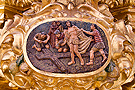 Cartela de la trasera de la canastilla del Paso de Nuestro Padre Jesús de la Vía-Crucis - 10º Estación: Jesús despojado de sus vestiduras