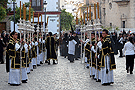 Cuerpo de Acólitos del paso de la Urna de la Hermandad del Santo Entierro con 18 ciriales