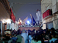 Paso de María Santísima del Consuelo frente a la "Casa de la Virgen" en el barrio de El Pelirón