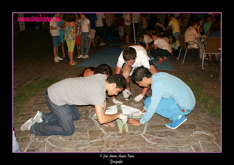 Montaje de alfombras para el Corpus Christi