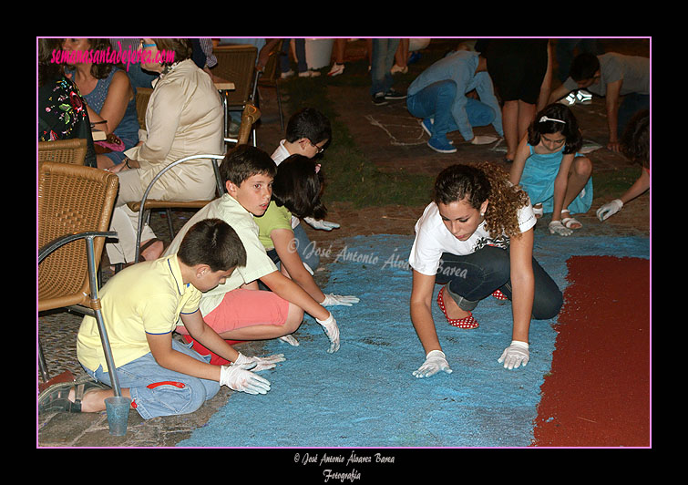 Montaje de alfombras para el Corpus Christi